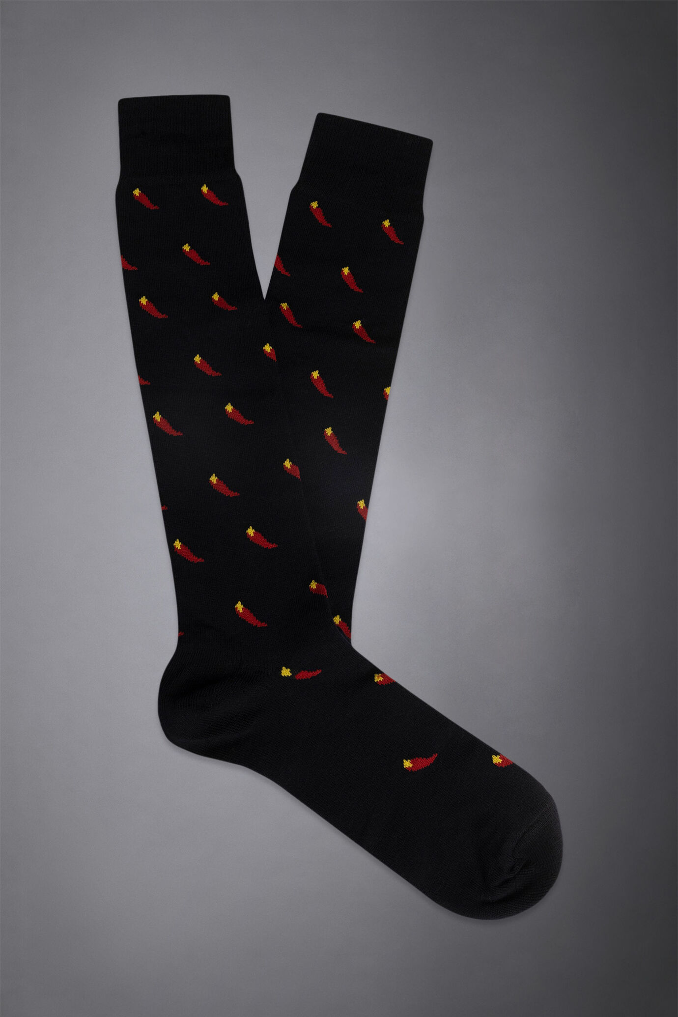 Knitted long socks with chili pepper pattern made in italy