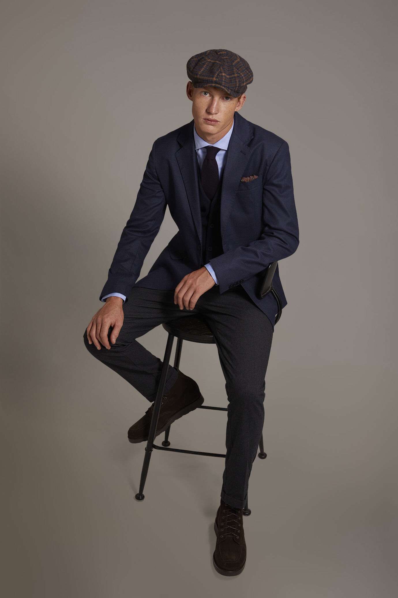 Single-breasted jacket with flap pockets in prince of wales fabric made in Italy image number 0