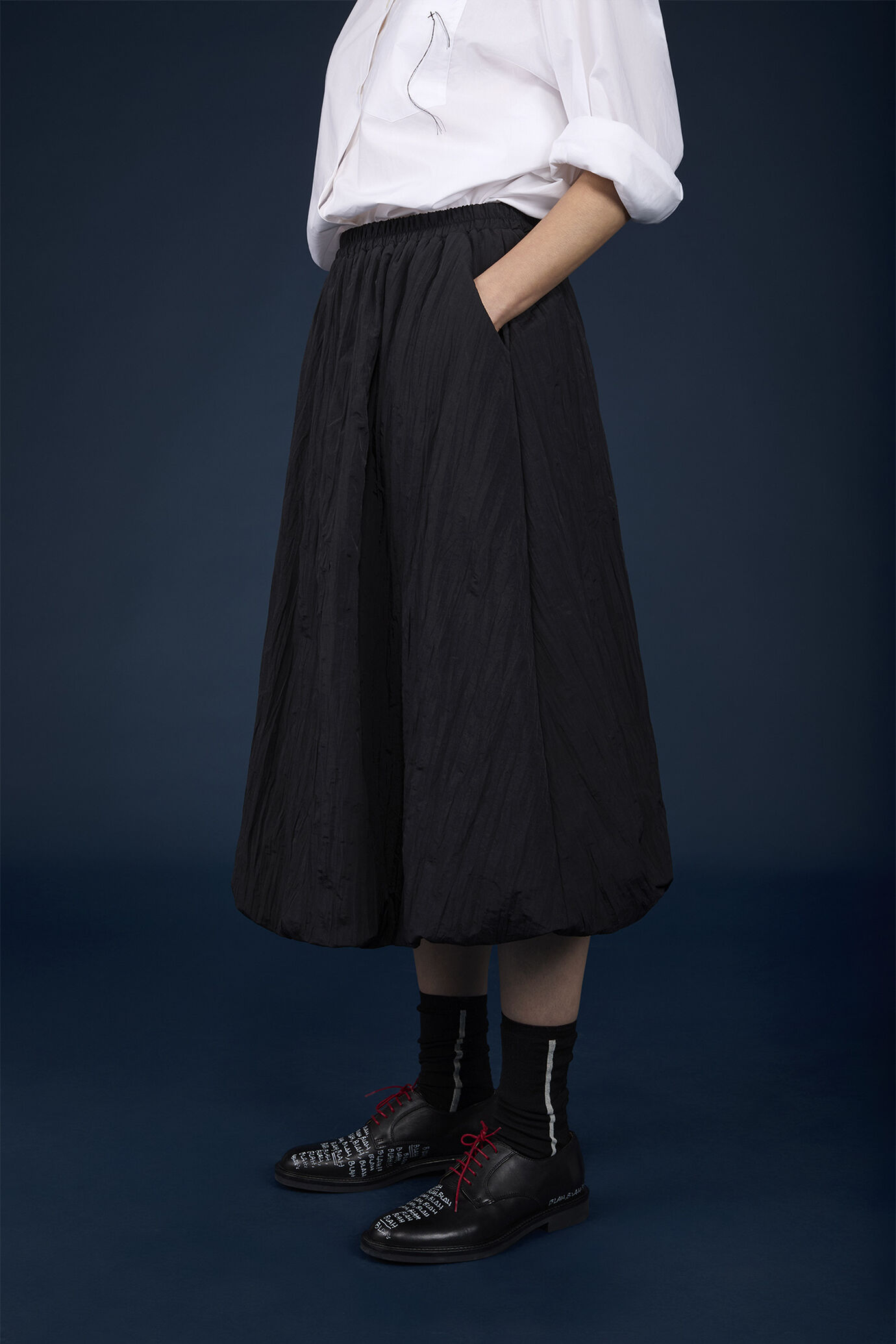 Midi skirt with remborsè workmanship in creased nylon with elastic waist image number 3