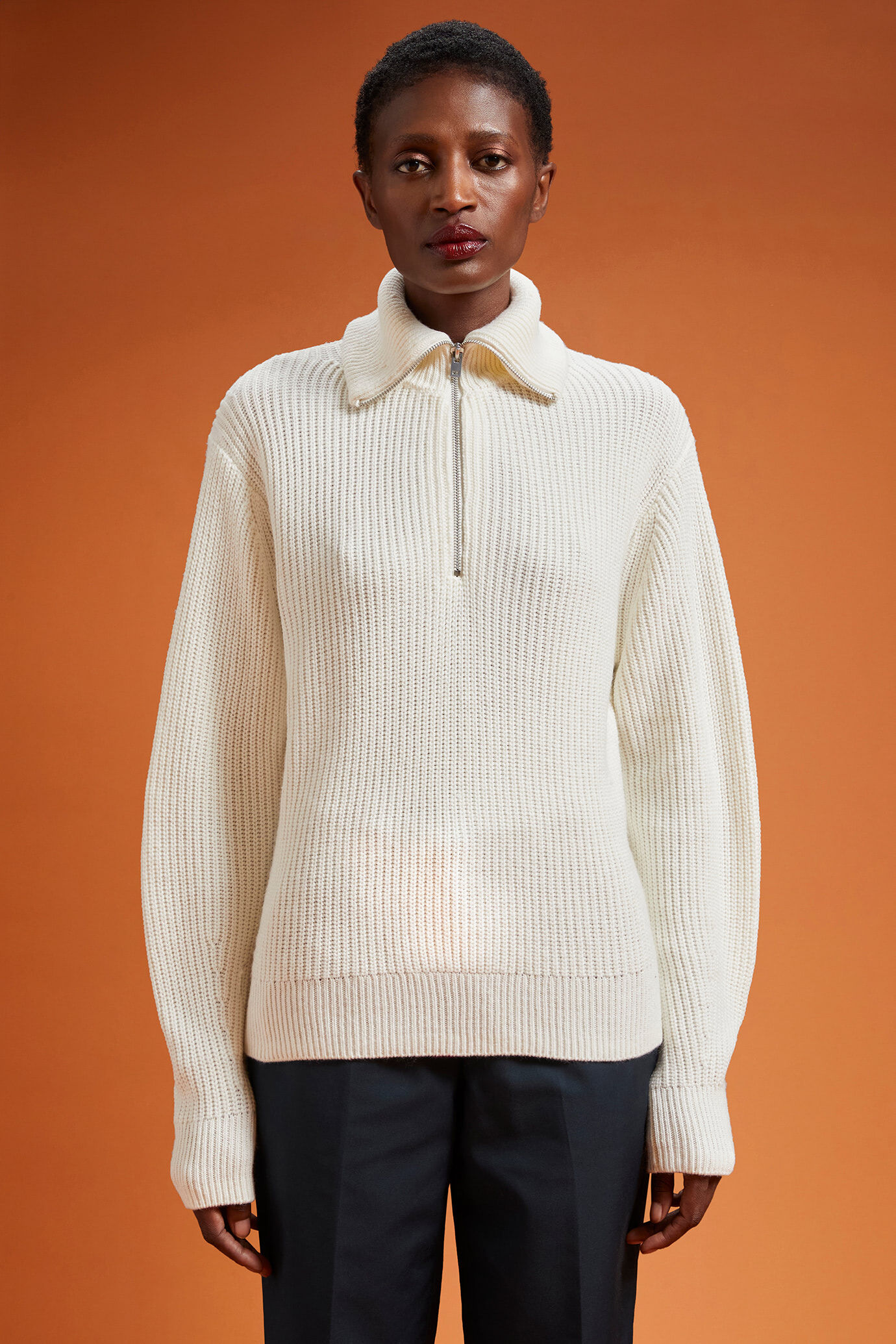Polo donna in maglia con mezza zip regular fit image number 0