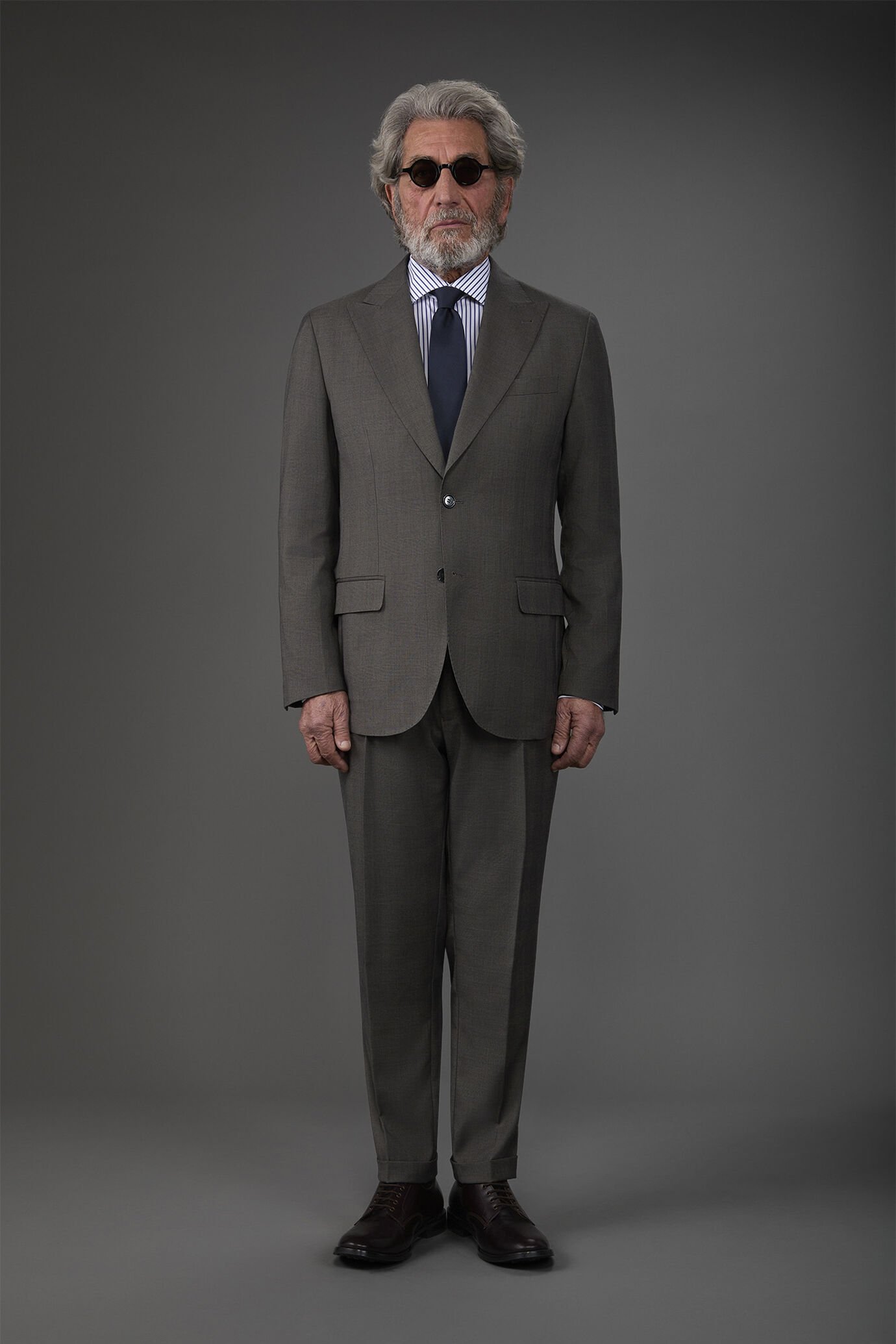 Abito uomo monopetto con pantalone ad una pinces tessuto dal disegno principe di galles