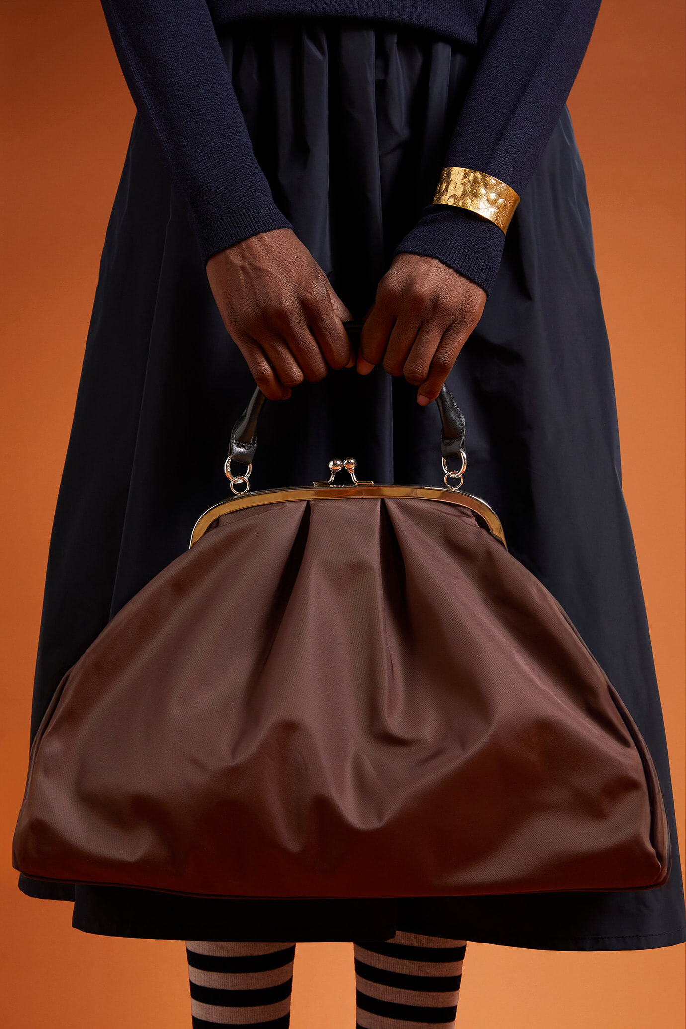 Women's bag made of technical fabric with faux leather details