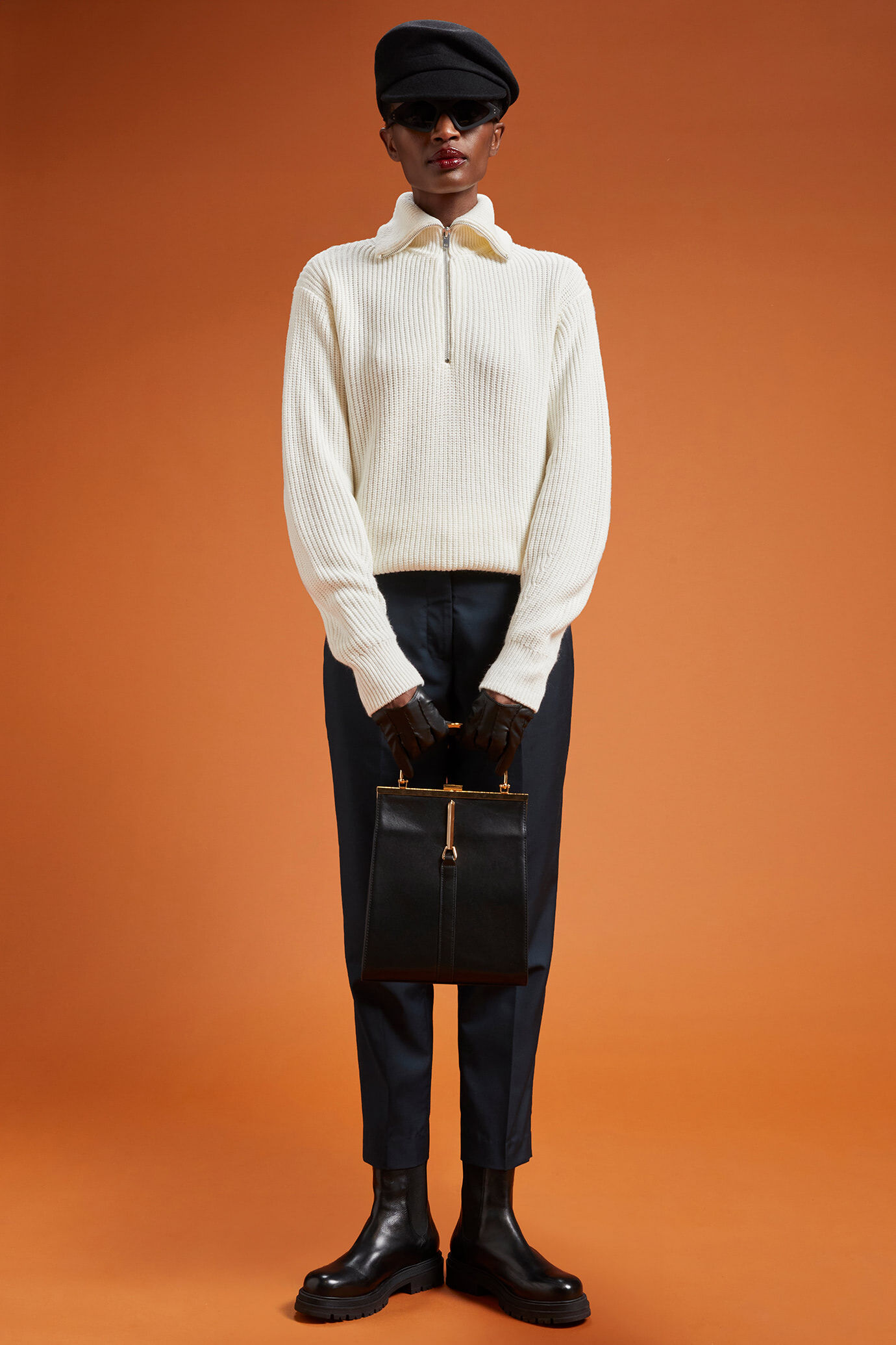 Polo donna in maglia con mezza zip regular fit image number 1