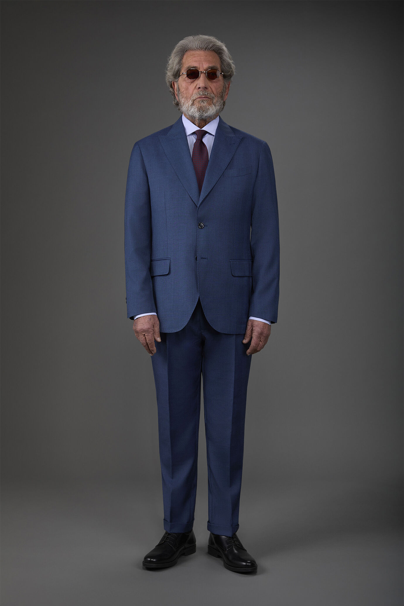 Abito uomo monopetto con pantalone ad una pinces tessuto dal disegno principe di galles