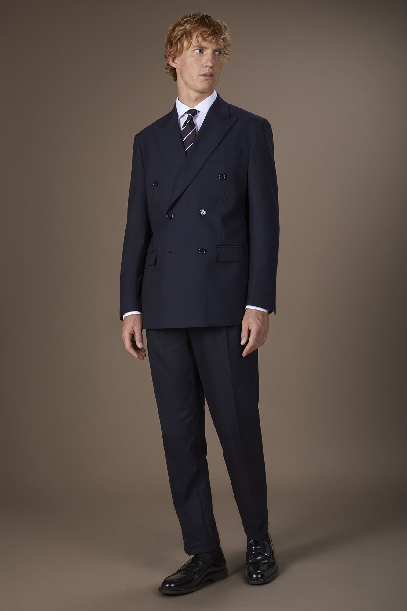 Men's regular fit double-breasted suit featuring a jacket