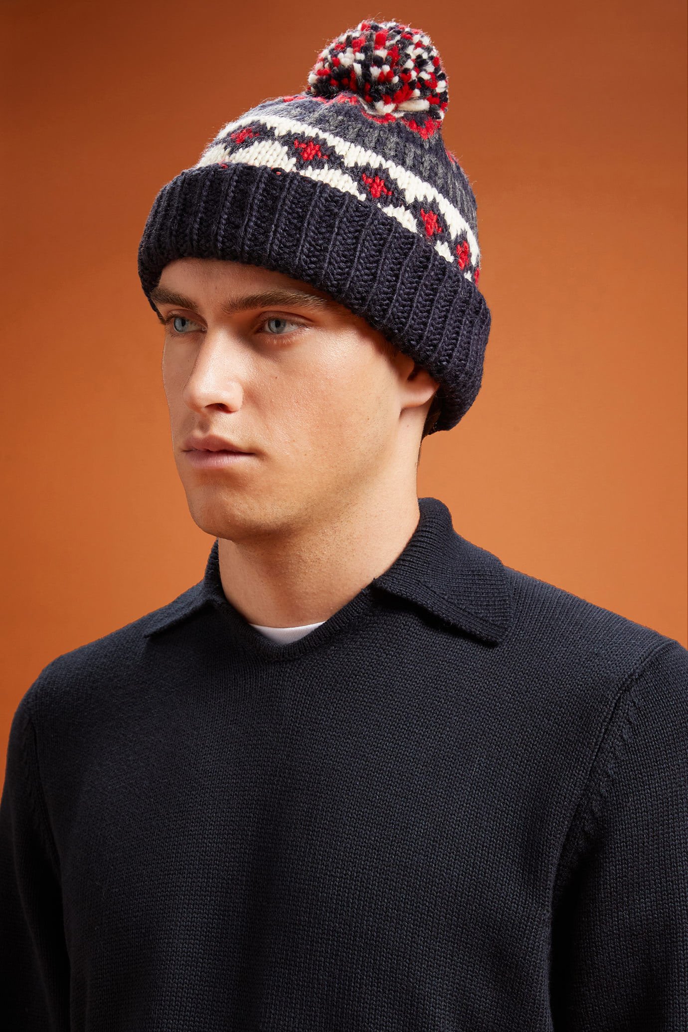 Men's ribbed hat in a Norwegian pattern with a pompom image number 1