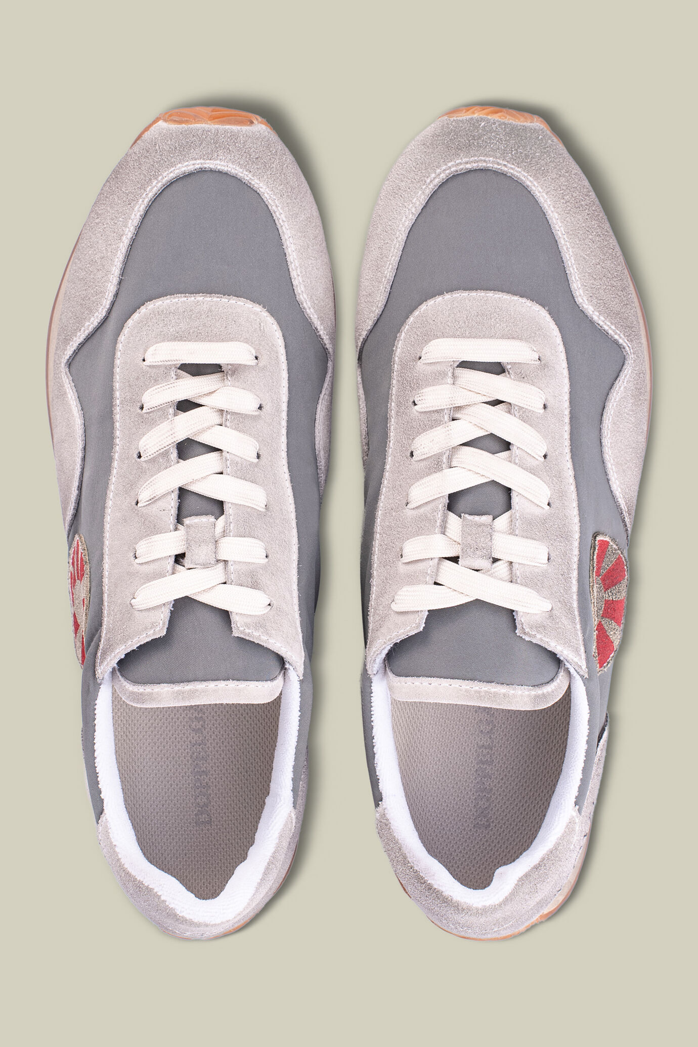 Sports shoe with suede leather covering