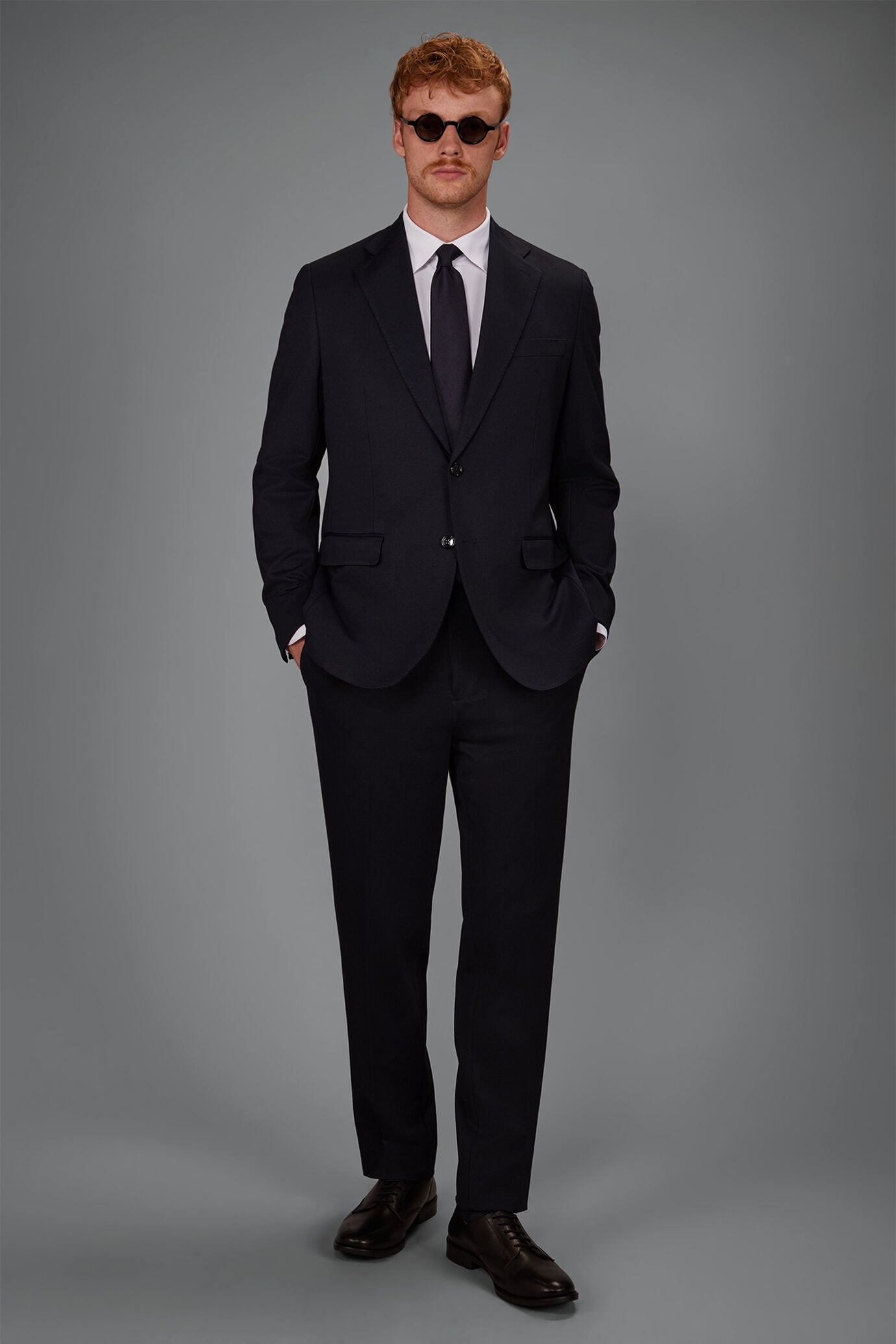 Costume homme &agrave; simple boutonnage en Jersey motif &oelig;il-de-perdrix coupe classique