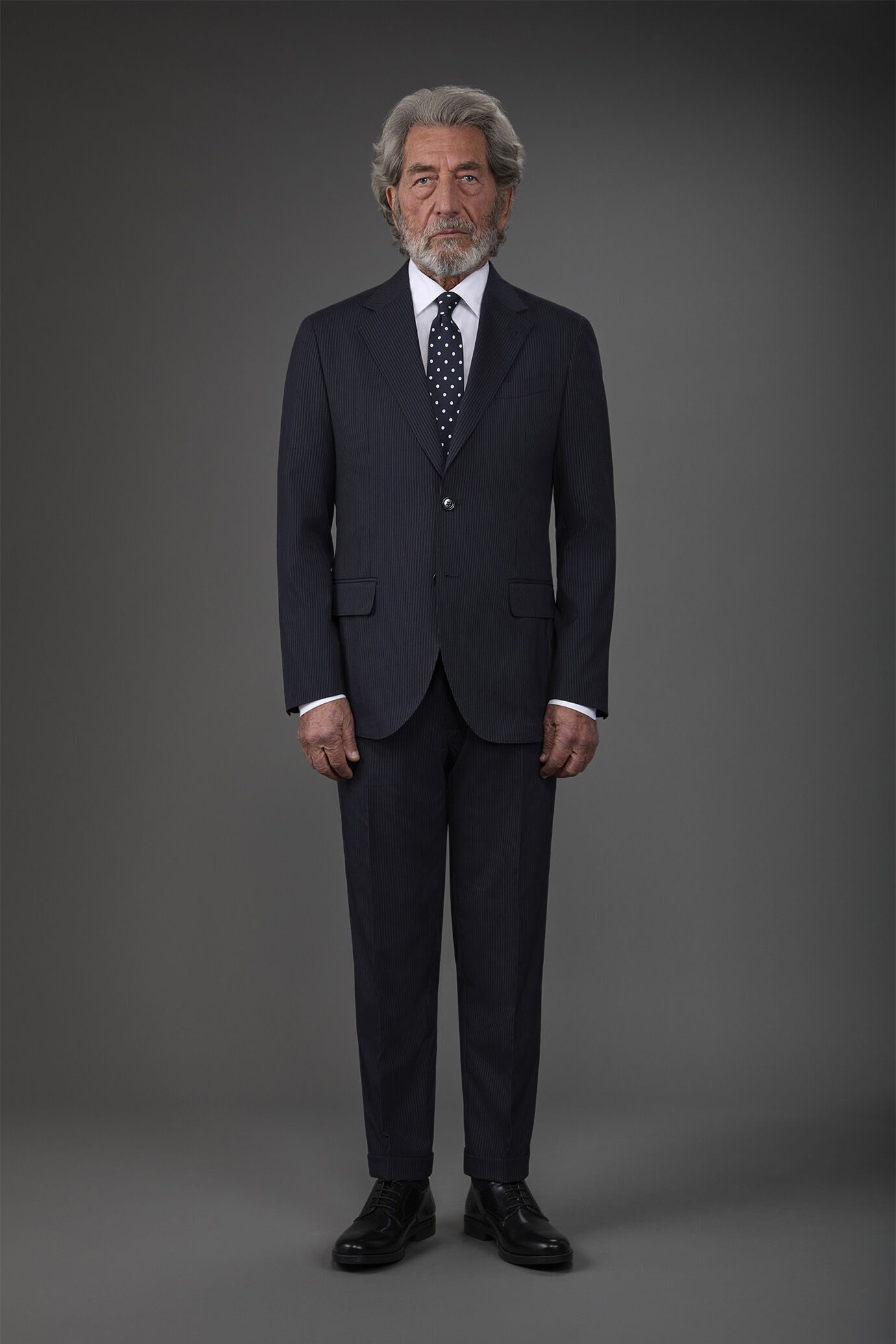 Single-breasted men's suit with flat front trousers in a pinstripe fabric image number 1