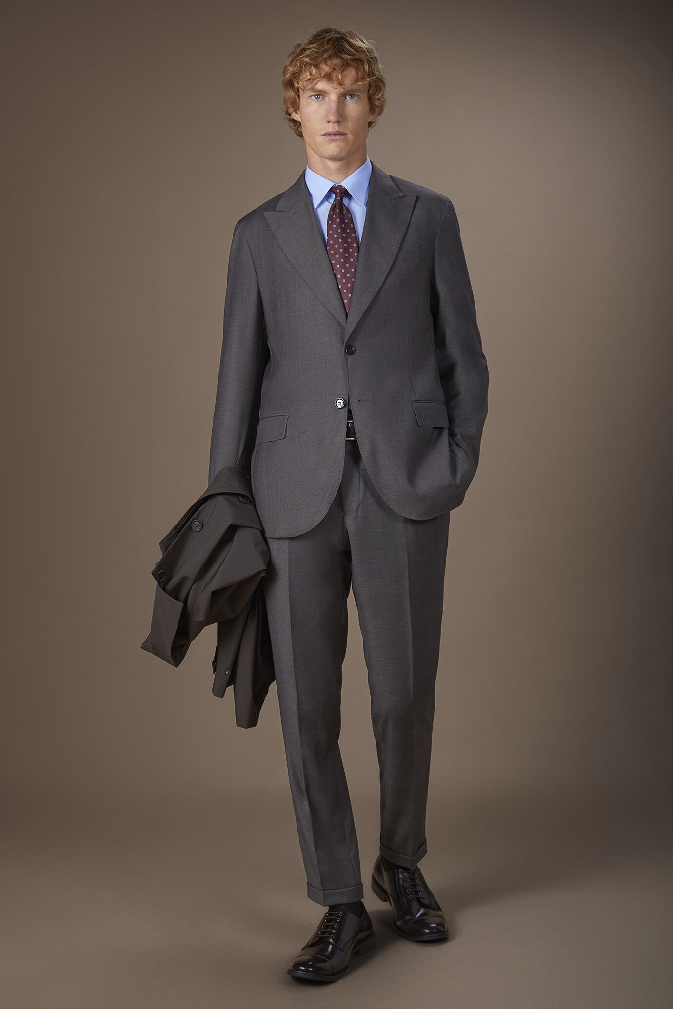 Abito uomo monopetto con pantalone ad una pinces tessuto dal disegno principe di galles