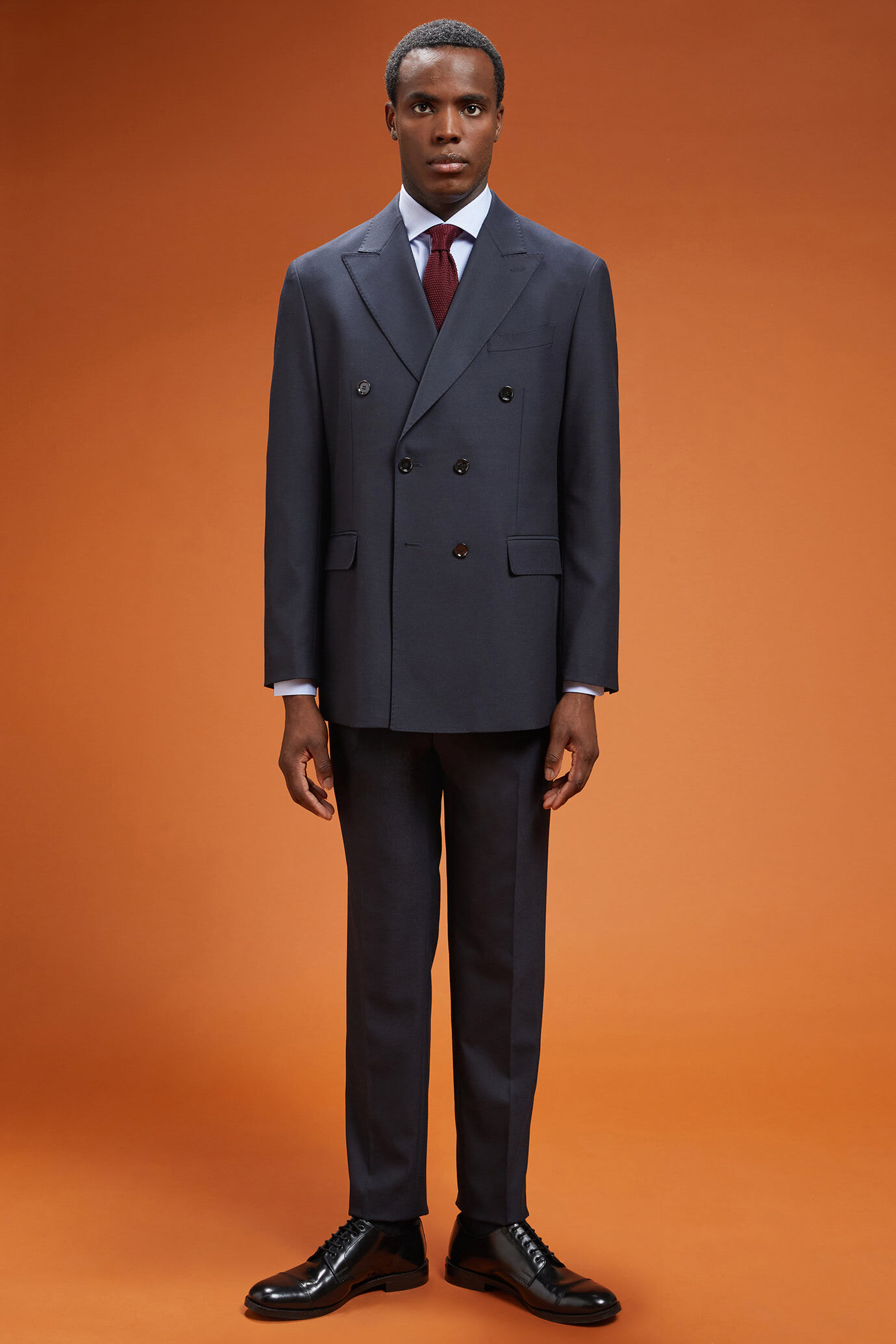 Men's regular fit double-breasted suit featuring a jacket with peak lapels in dobby fabric image number 0