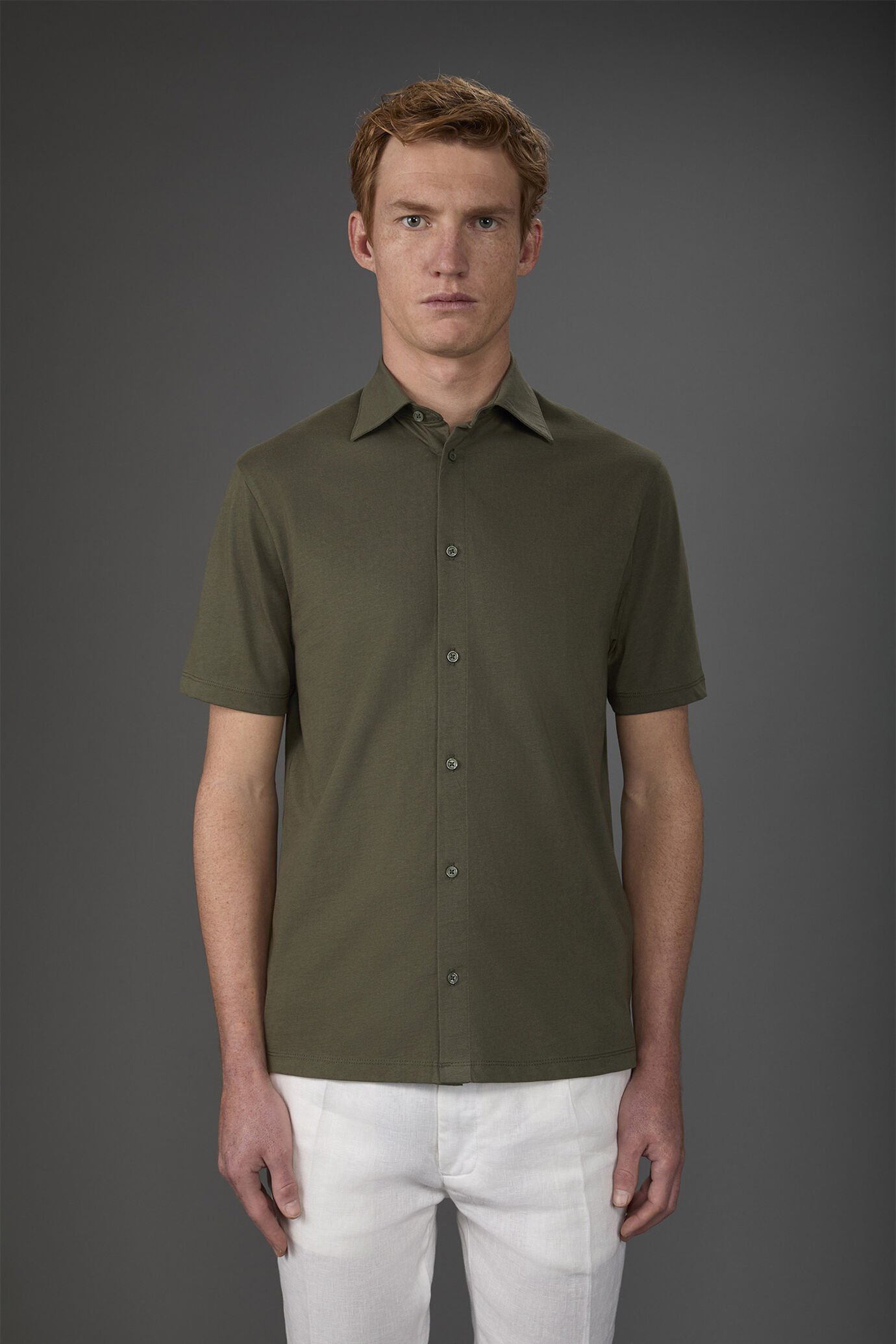 Men's short-sleeved polo shirt in 100% cotton jersey image number 0