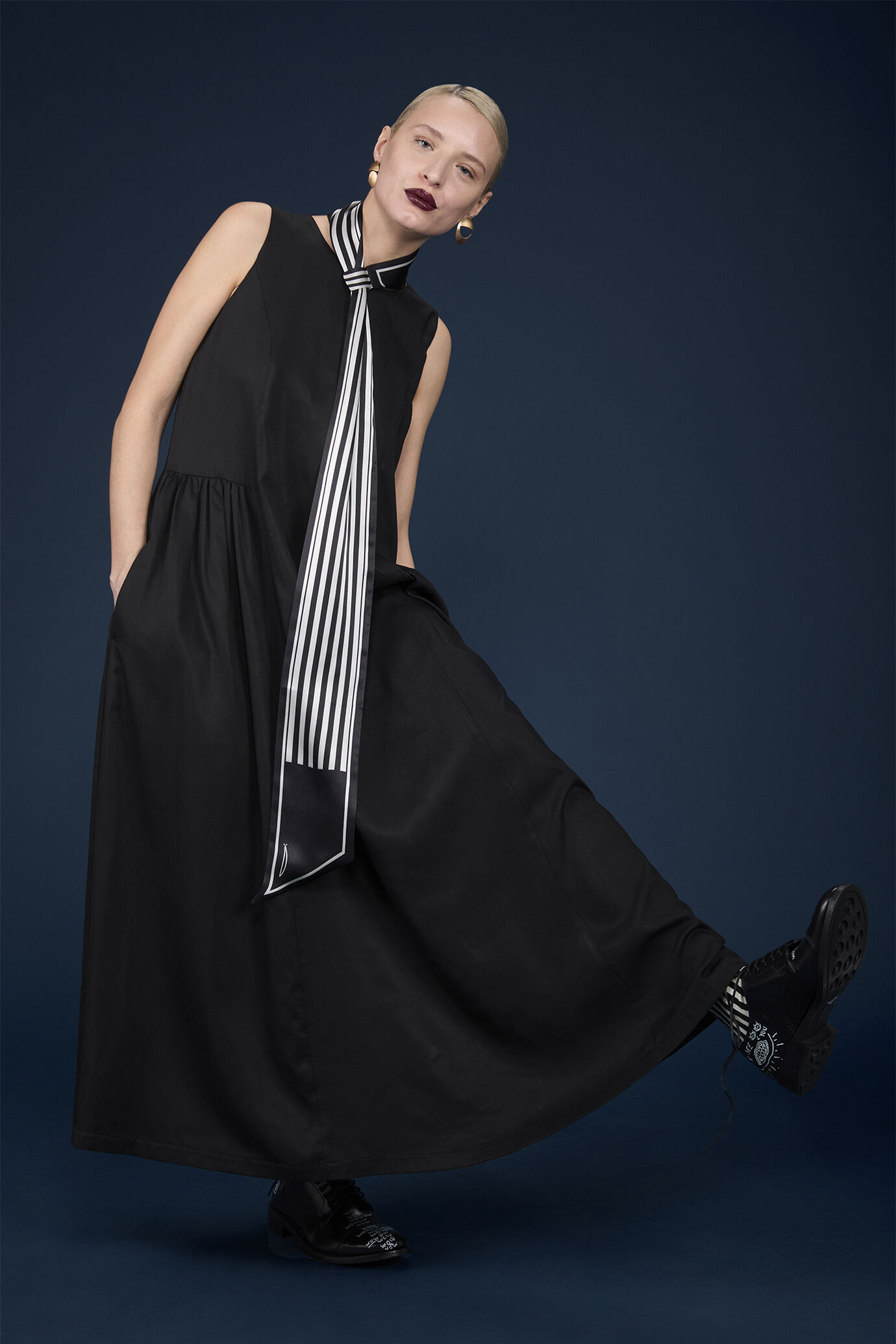 Sleeveless dress with drop front and gathered panels at the hips image number 0