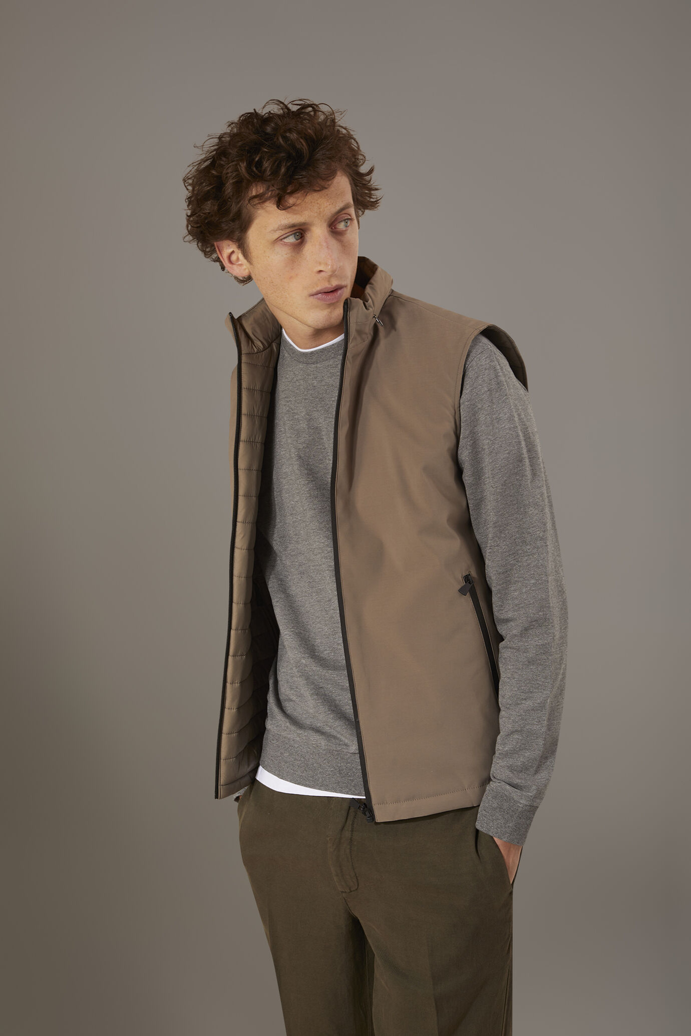 Reversible gilet with storm hood image number 1