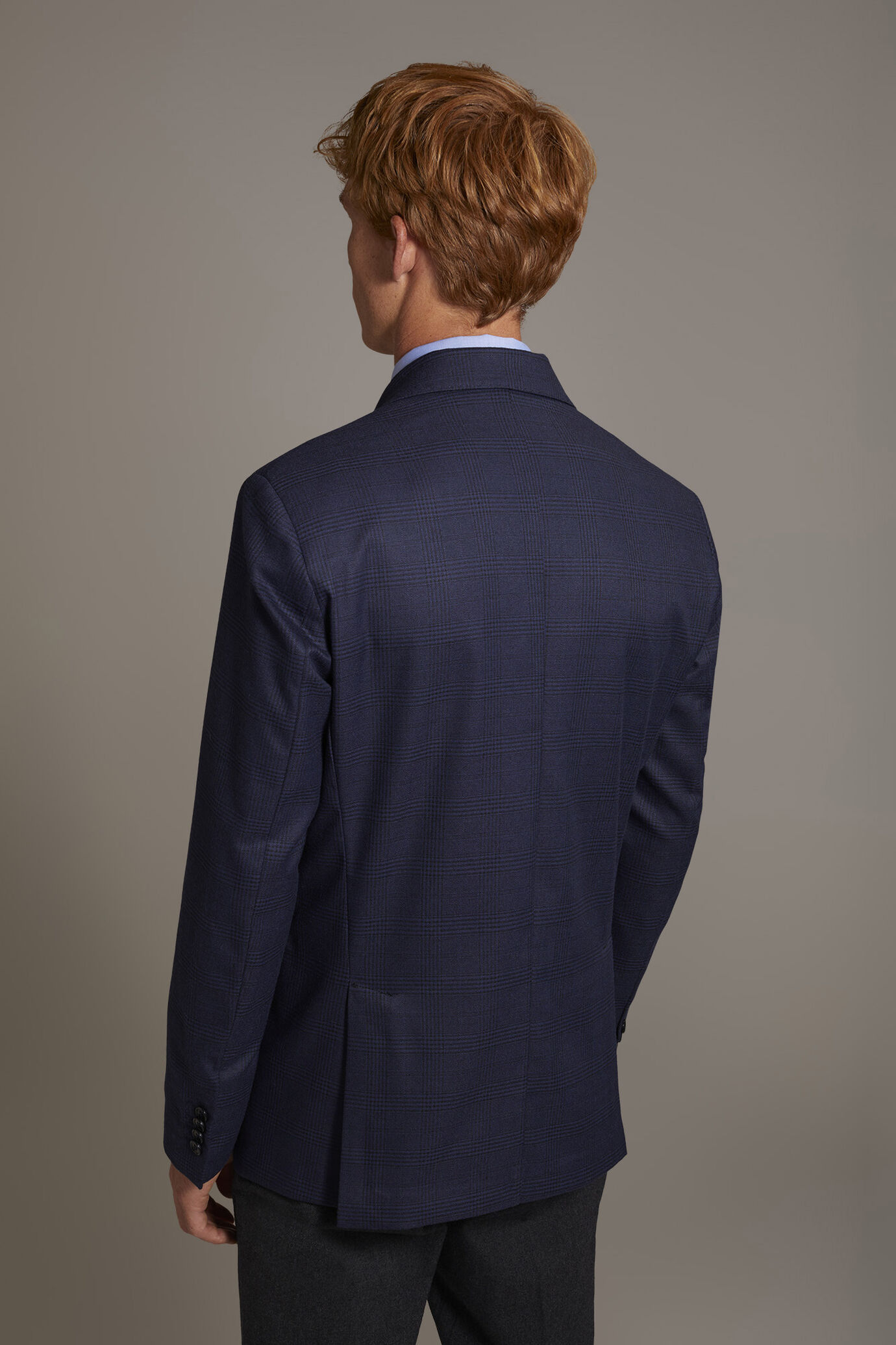 Single-breasted jacket with flap pockets in prince of wales fabric made in Italy image number 4