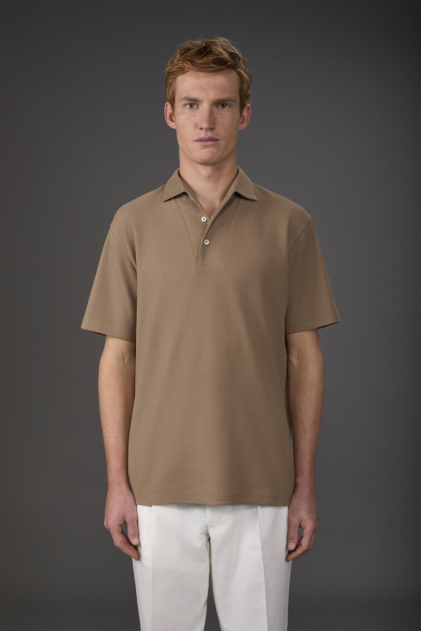 Men's short-sleeved polo shirt in 100% honeycomb cotton image number 0