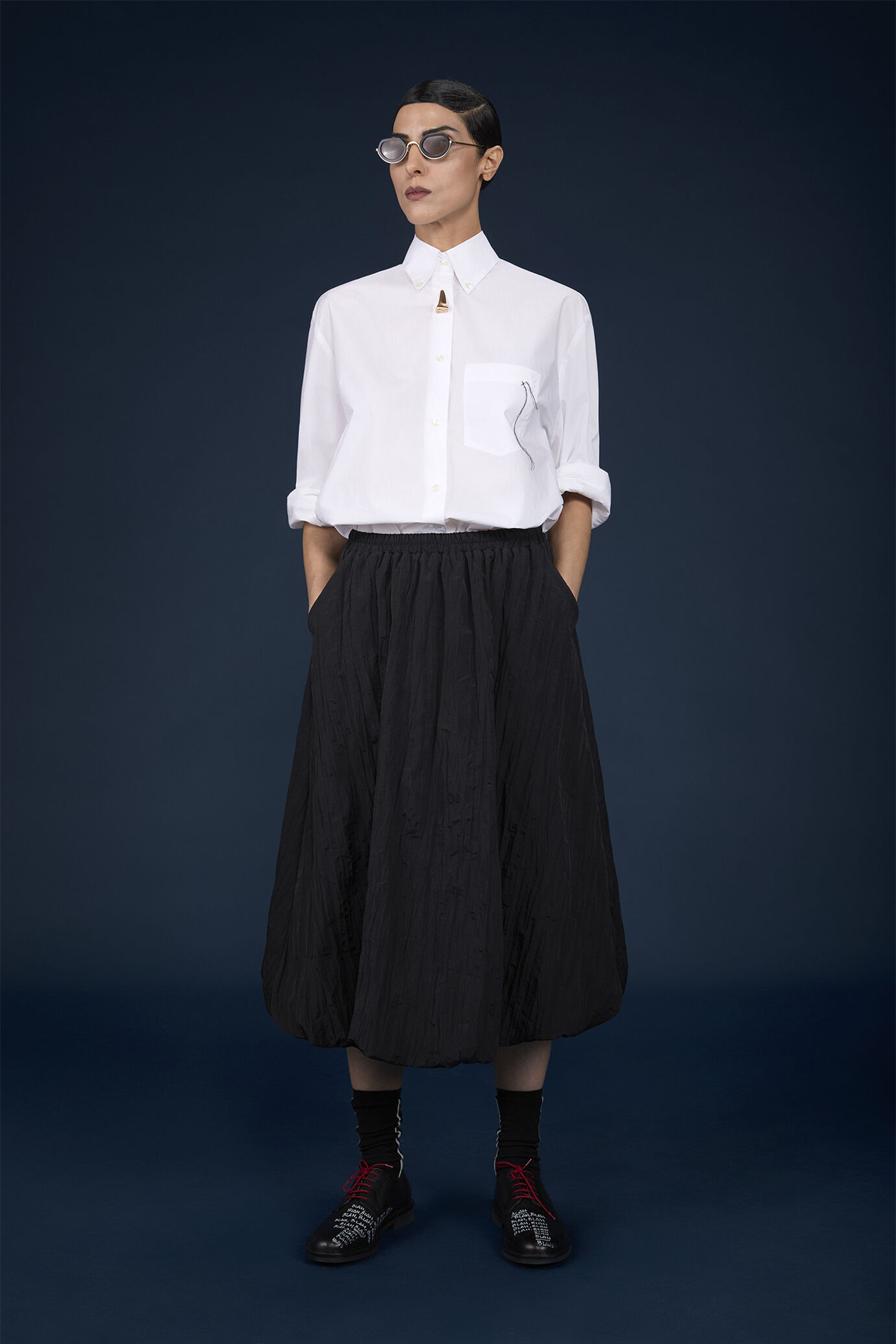 Midi skirt with remborsè workmanship in creased nylon with elastic waist image number 1