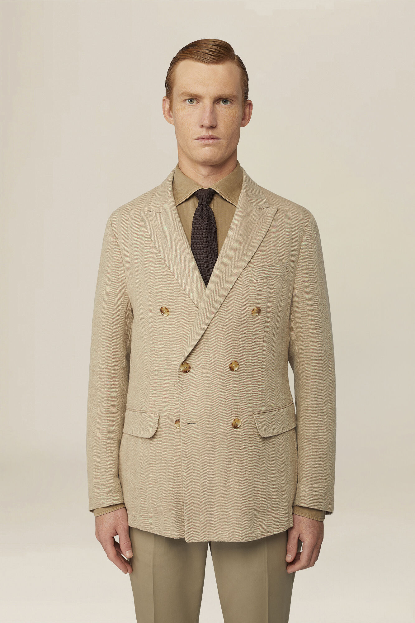 Men's unlined double-breasted jacket with peak lapels and flap