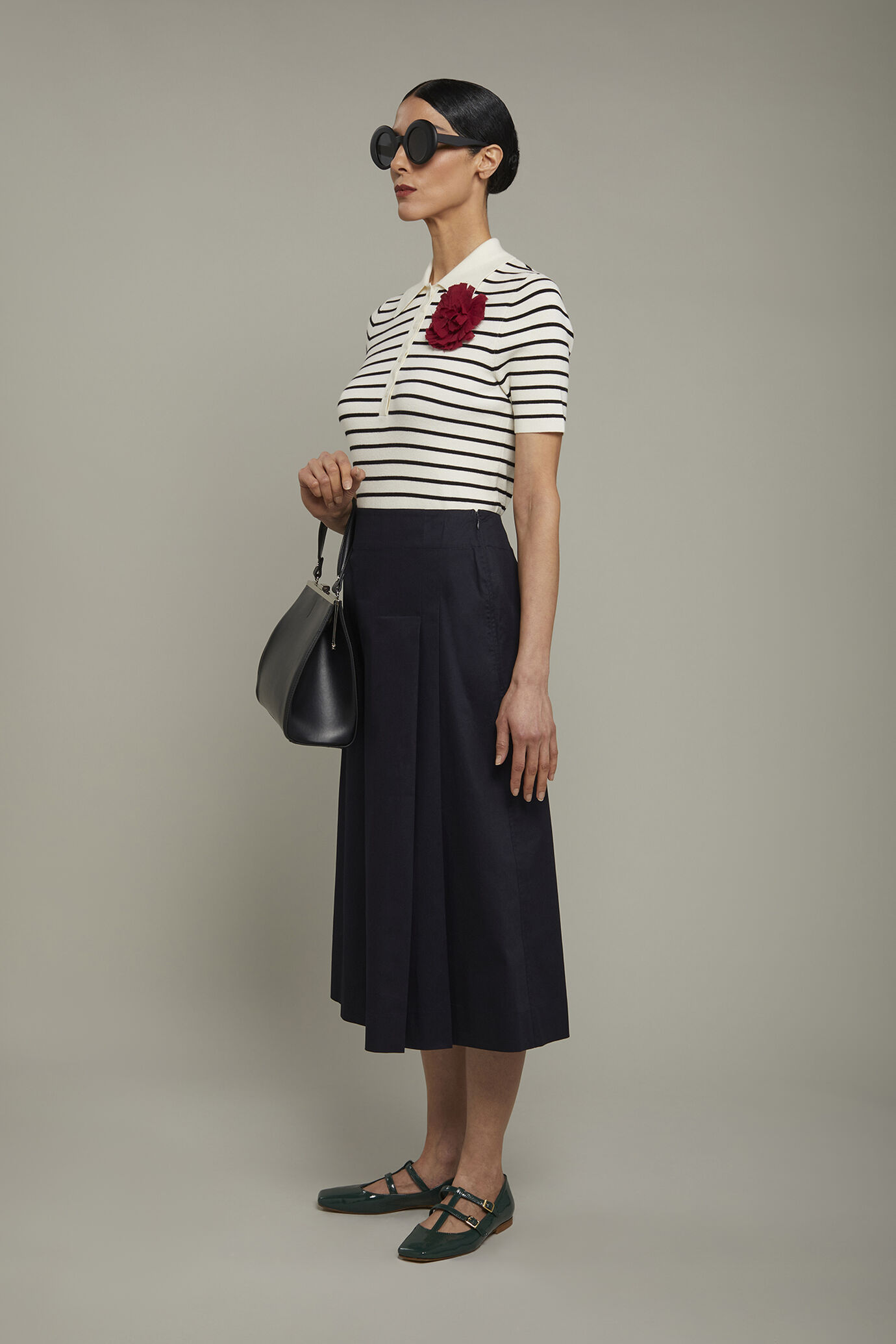 Gestreiftes kurzärmeliges Damen-Poloshirt aus Strick image number 1