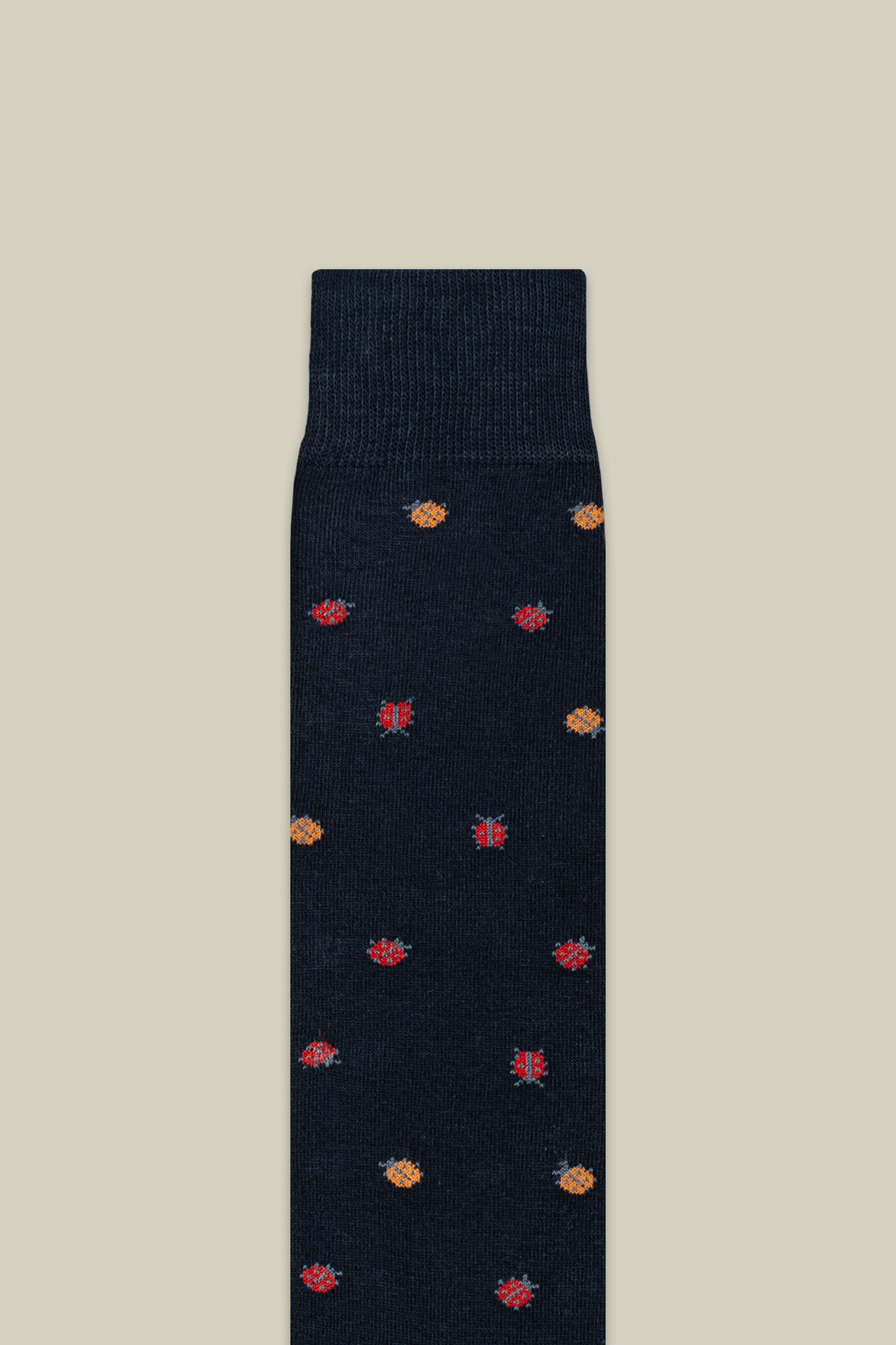 Chaussettes pour homme en maille lisse avec motif coccinelle