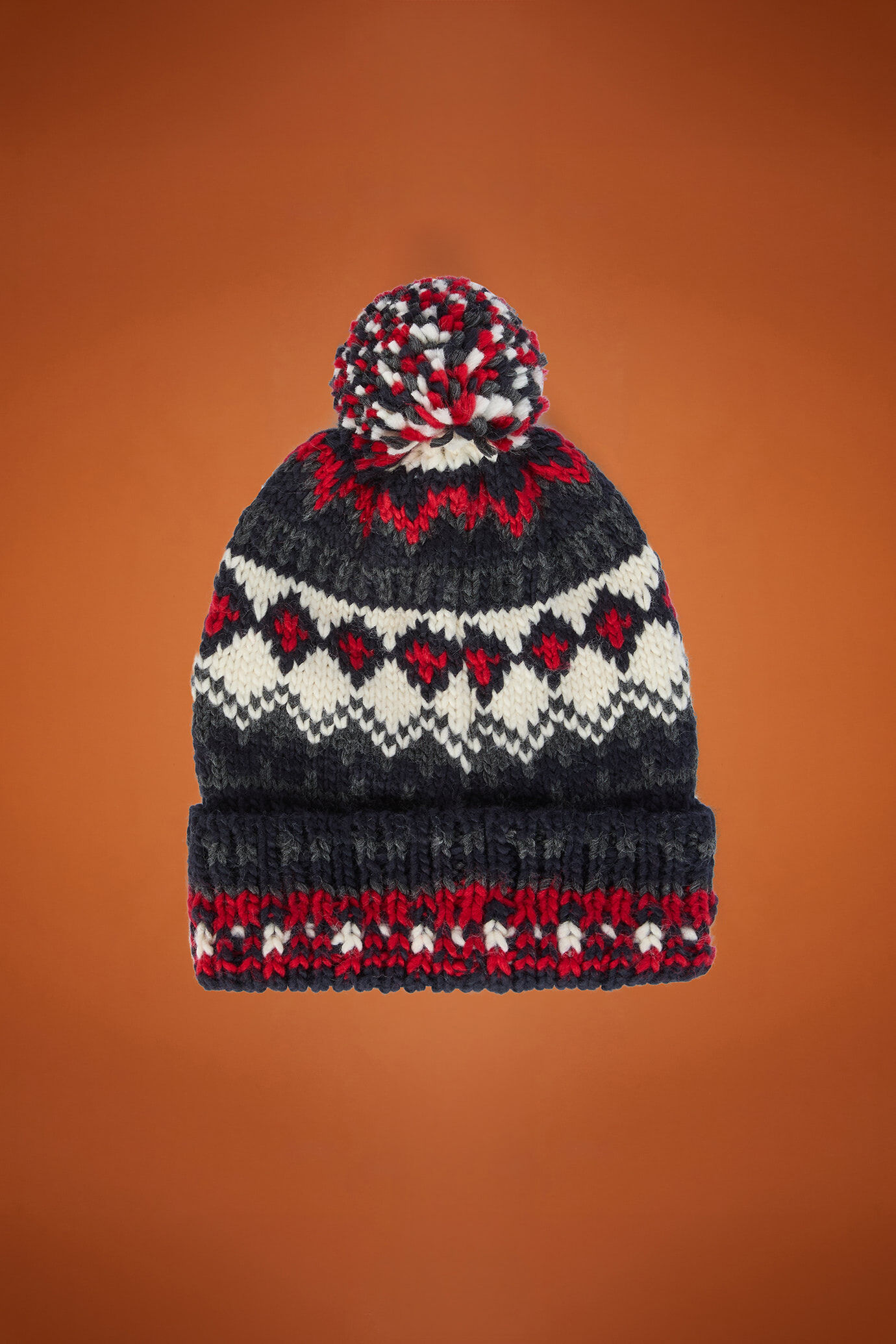 Men's ribbed hat in a Norwegian pattern with a pompom image number 0