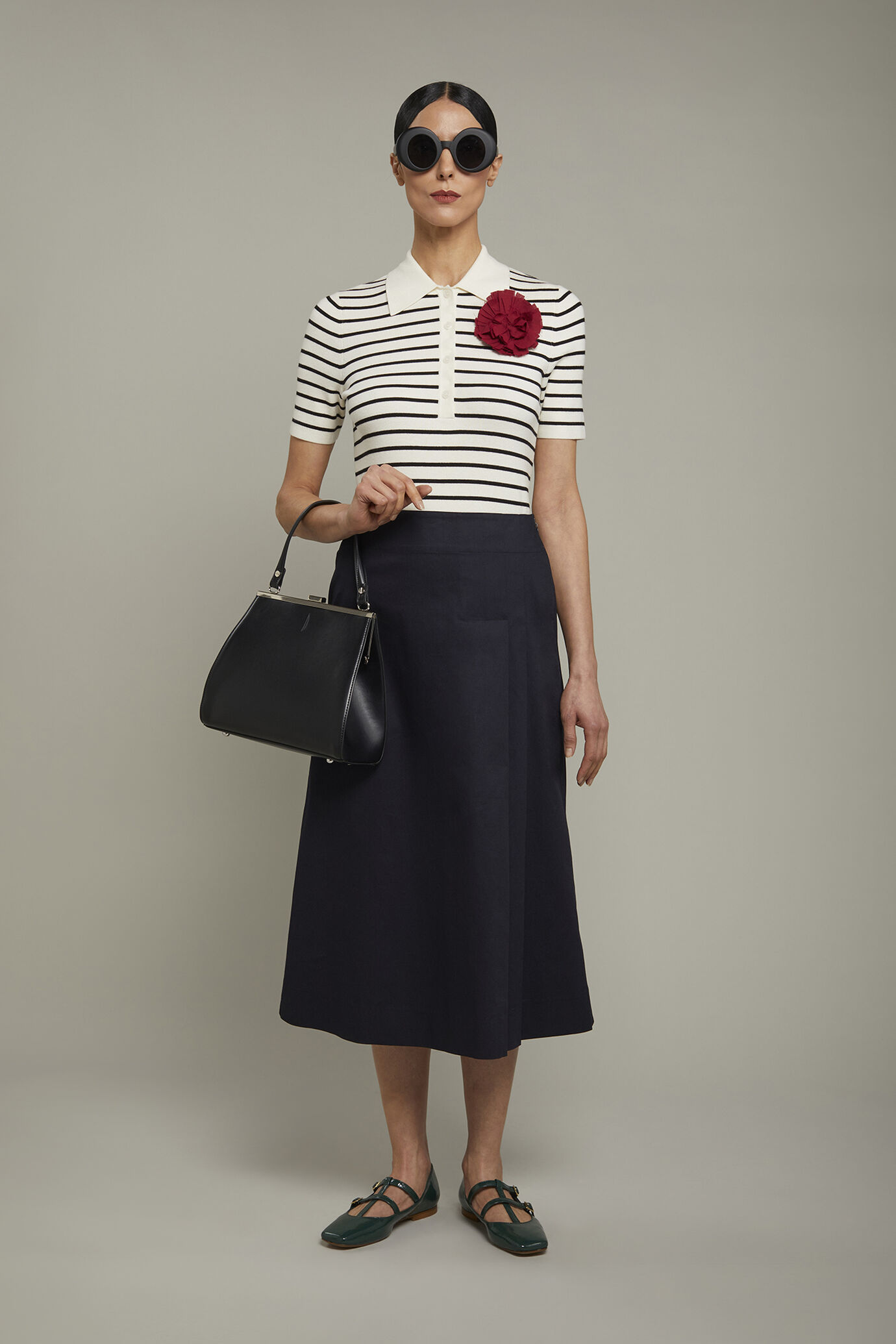 Polo donna in maglia con manica corta a righe image number 0