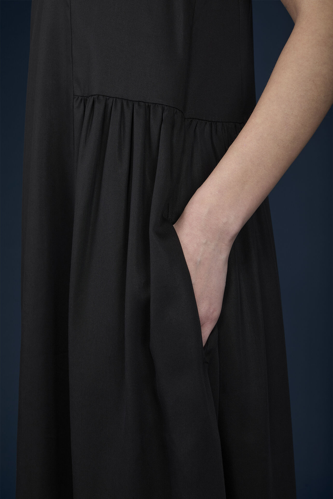 Sleeveless dress with drop front and gathered panels at the hips image number 3