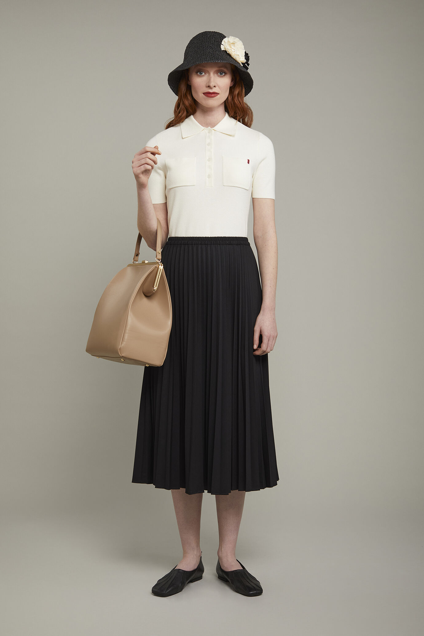 Polo femme en maille à manches courtes, couleur unie image number 0