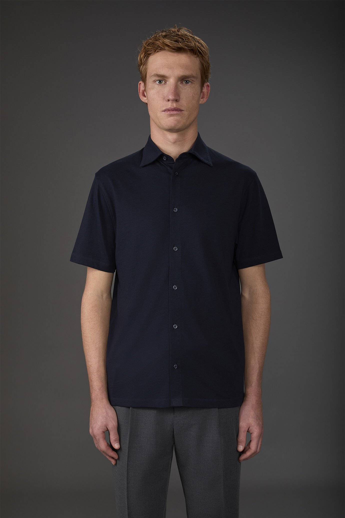 Men's short-sleeved polo shirt in 100% cotton jersey