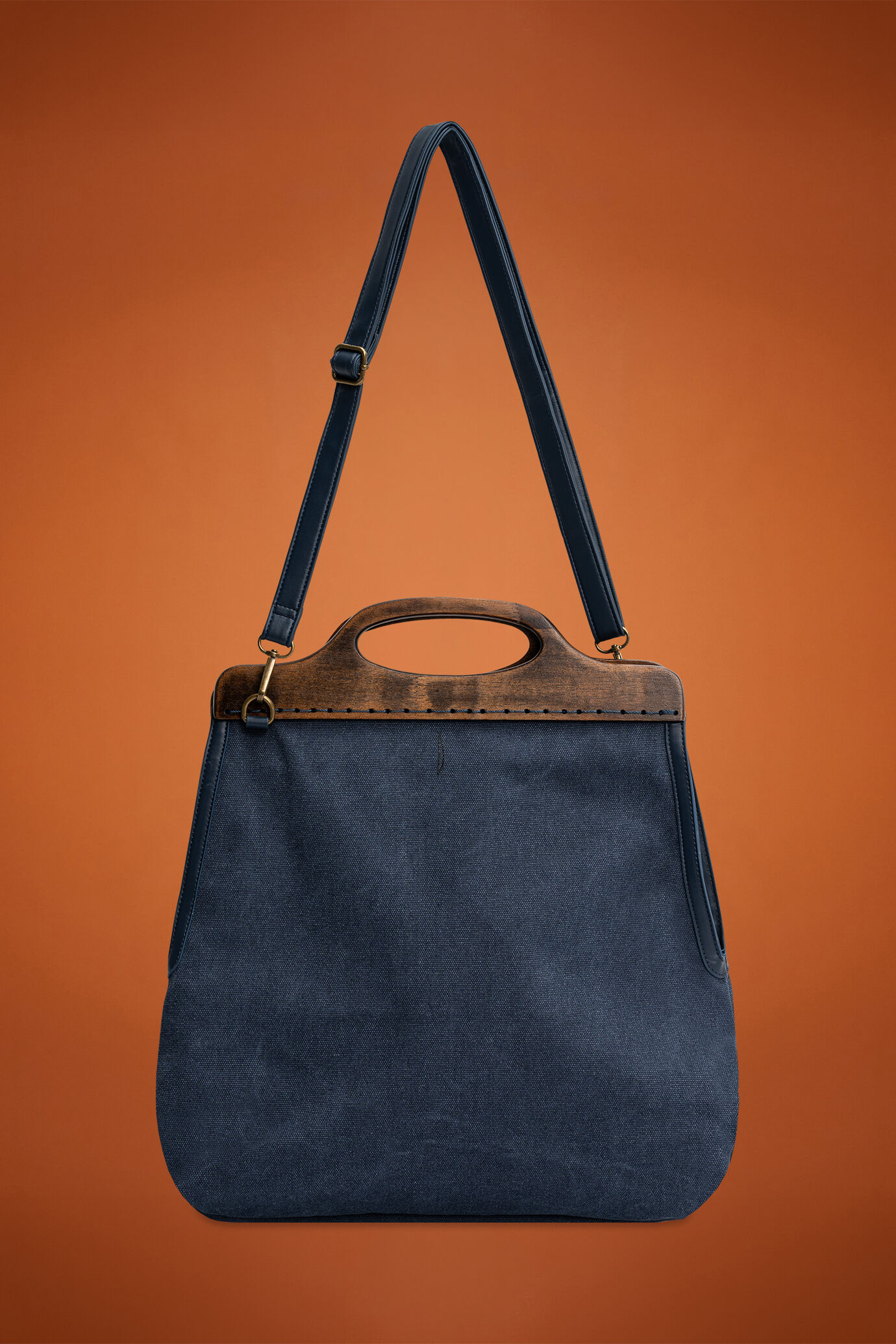 Women’s canvas bag with shoulder strap and rigid handle