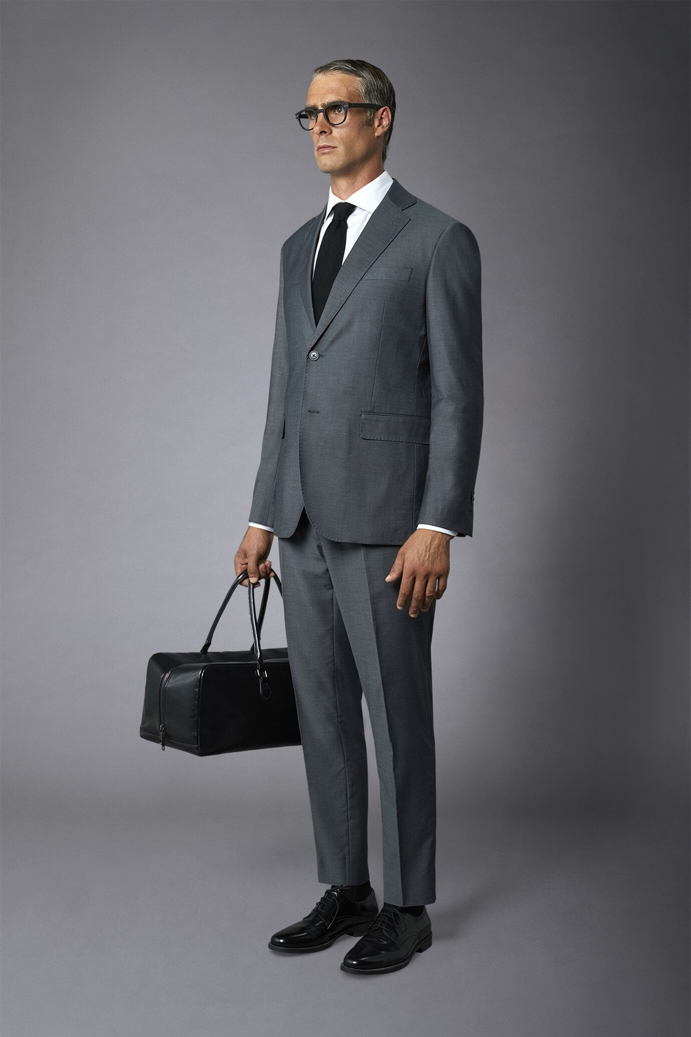 Einreihiger Anzug in normaler Passform aus Rebhuhnauge Stoff image number 1
