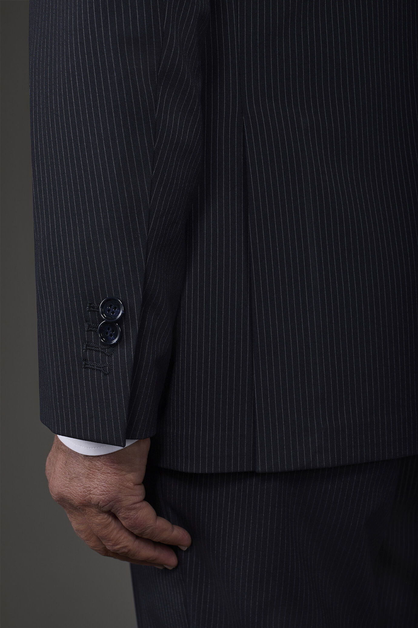 Single-breasted men's suit with flat front trousers in a pinstripe fabric image number 3