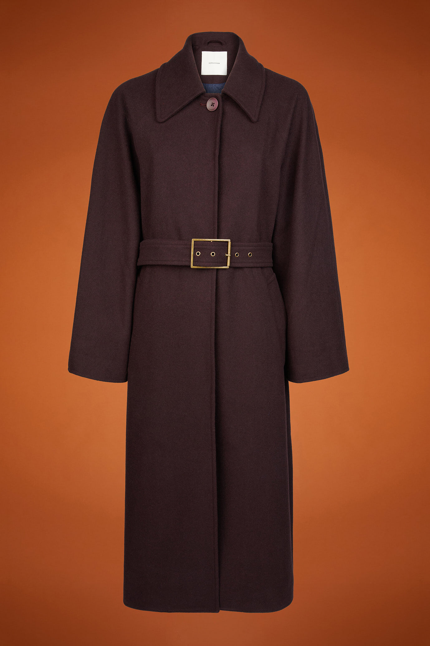 Women's long single-breasted coat with raglan sleeves and a