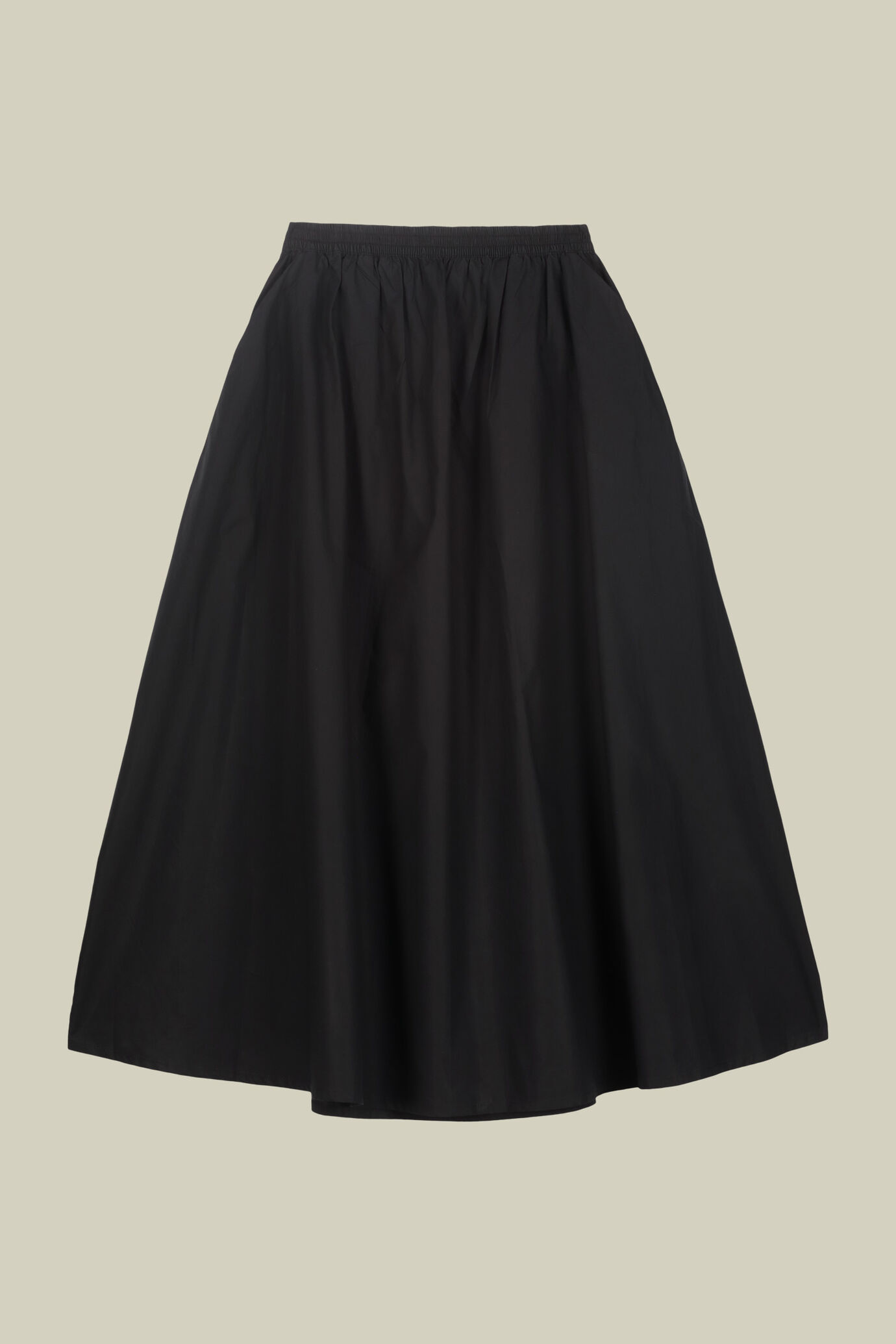 Long flared skirt with elastic waist and side pockets